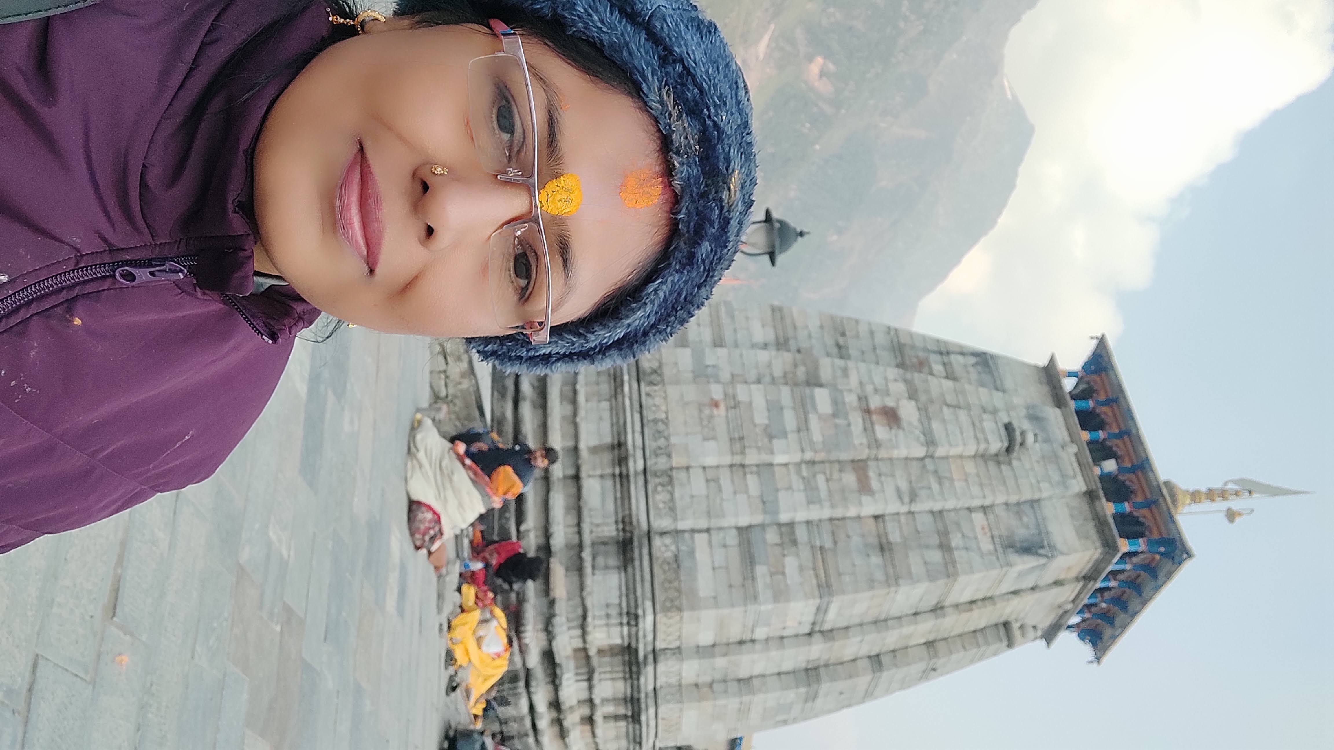 Sangeeta Kumari at a Himalayan temple with tilak